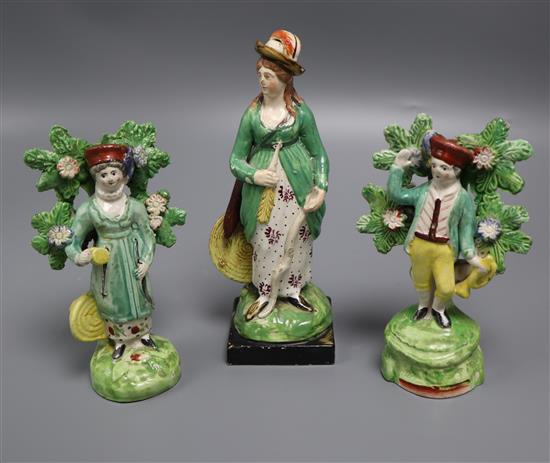 A near pair of 19th century Walton type pearlware figures and one other tallest 18cm